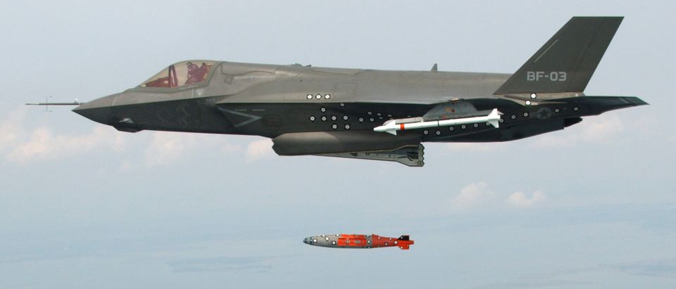 BF-3, a short take-off and vertical landing F-35 Lightning II, releases an inert 1,000 lb. GBU-32 Joint Direct Attack Munition (JDAM) separation weapon over water in an Atlantic test range in Patuxent River, Maryland August 8, 2012. A Lockheed Martin Corp F-35 Joint Strike Fighter aircraft has dropped its first bomb in a new test stage of the Pentagon's costliest weapons purchase, officials said August 9, 2012. (REUTERS/Andy Wolfe)