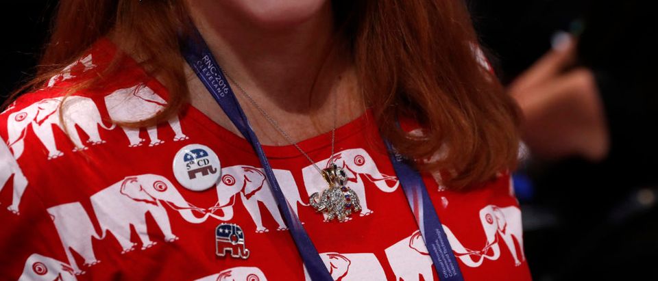 A delegate wears elephant-themed shirt and jewelry before the start of the final day of the Republican National Convention in Cleveland