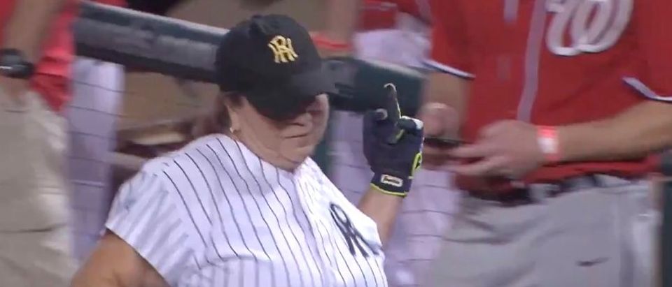 Rep. Sanchez gives the GOP dugout the middle finger during the Congressional baseball game. (Screenshot Twitter Ryan Saavedra)
