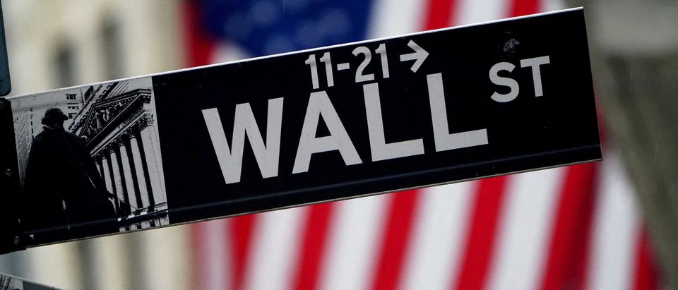 FILE PHOTO: A Wall Street sign is pictured outside the New York Stock Exchange, in New York City