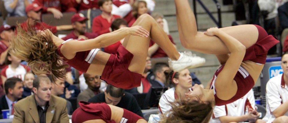 Oklahoma cheerleaders do flip in Denver