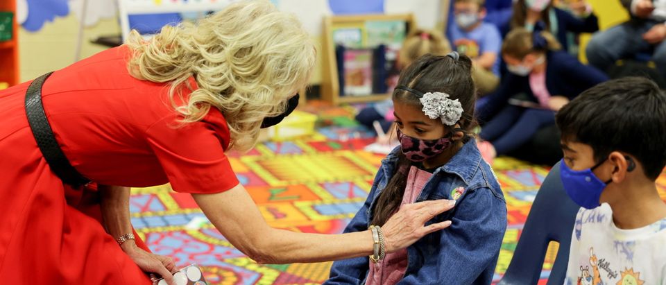 U.S. first lady Jill Biden and Dr. Vivek Murthy visit a pediatric COVID-19 vaccination clinic at Franklin Sherman Elementary School in McLean, Virginia