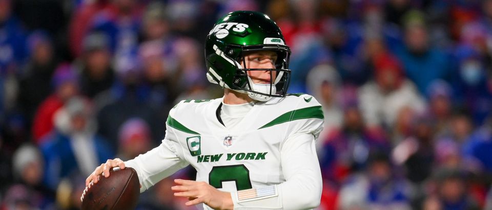Jan 9, 2022; Orchard Park, New York, USA; New York Jets quarterback Zach Wilson (2) passes the ball against the Buffalo Bills during the first half at Highmark Stadium. Mandatory Credit: Rich Barnes-USA TODAY Sports via Reuters