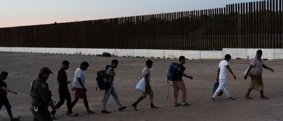 Migrants cross the U.S.-Mexico border in Texas