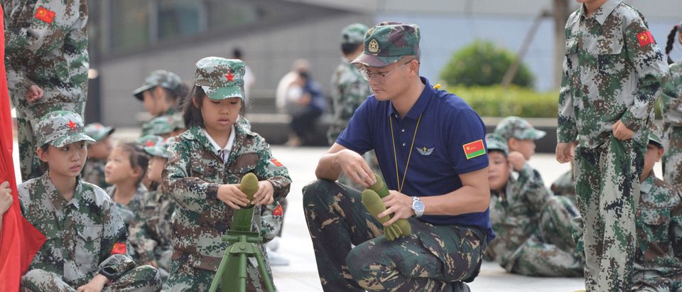 Children attend a military summer camp in Hefei