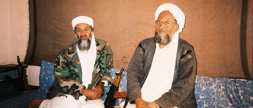 FILE PHOTO: Osama bin Laden sits with his adviser Ayman al-Zawahiri, an Egyptian linked to the al Qaeda network, during an interview with Pakistani journalist Hamid Mir (not pictured) in an image supplied by Dawn newspaper November 10, 2001. Hamid Mir/Editor/Ausaf Newspaper for Daily Dawn/Handout via REUTERS/File Photo THIS IMAGE HAS BEEN SUPPLIED BY A THIRD PARTY.