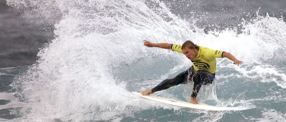 BAKIO, SPAIN: Chris Davidson of Australia wins his opening round heat at the Billabong Pro in Bakio, Spain 21 October, 2003. PIERRE TOSTEE/AFP via Getty Images