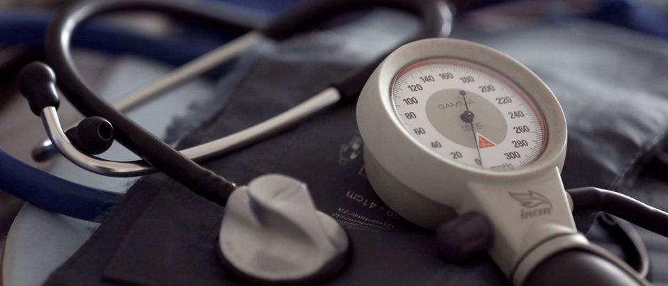 FILE PHOTO: A photo illustration shows a stethoscope and blood-pressure machine of a French general practitioner displayed in a doctor's office in Bordeaux