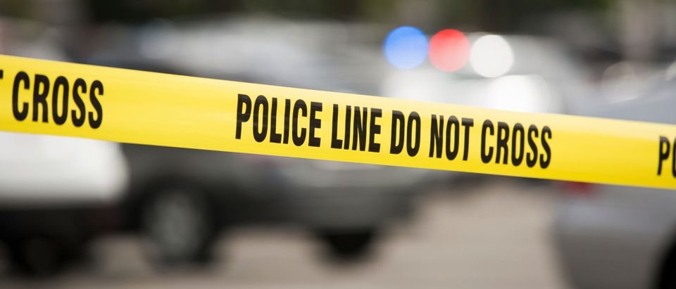 Police tape cordons off a crime scene [Shutterstock Matt Gush]