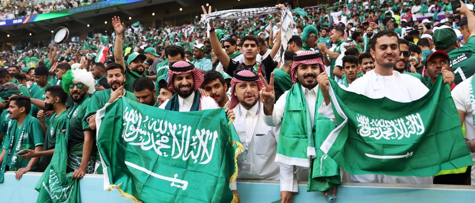 Saudi Arabia fans celebrate their team's 2-1 victory in the FIFA World Cup Qatar 2022 Group C match between Argentina and Saudi Arabia at Lusail Stadium on November 22, 2022 in Lusail City, Qatar. (Photo by Clive Brunskill/Getty Images)