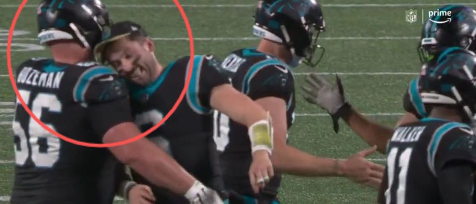 During the Nov. 10 "Thursday Night Football" game between the Carolina Panthers and Atlanta Falcons, Panthers backup quarterback Baker Mayfield would celebrate in a controversial way, headbutting his teammates on the sidelines. [Twitter/Screenshot/Public — User: @MySportsUpdate]