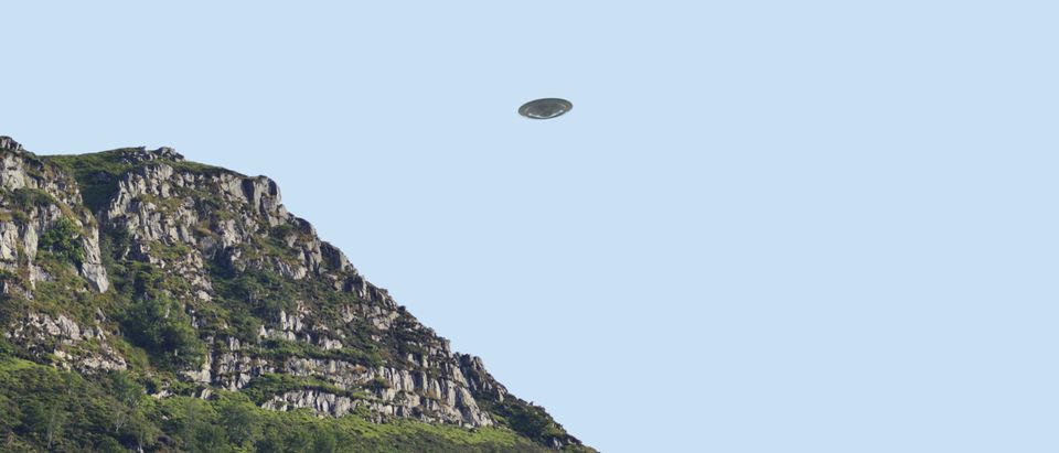 Flying,Saucer,Ufo,Over,Bluff/,Cliff,Side,In,Summer,,Clear