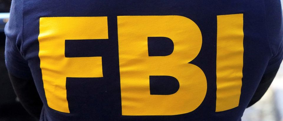 An FBI logo is pictured on an agent's shirt in the Manhattan borough of New York City An FBI logo is pictured on an agent's shirt in the Manhattan borough of New York City