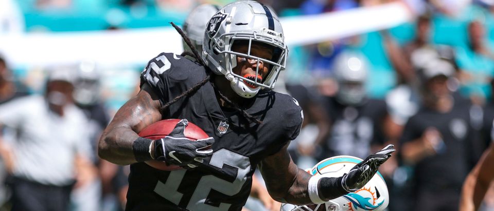 Martavis Bryant #12 of the Oakland Raiders runs for yardage during the second quarter against the Miami Dolphins at Hard Rock Stadium on September 23, 2018 in Miami, Florida. (Photo by Marc Serota/Getty Images)