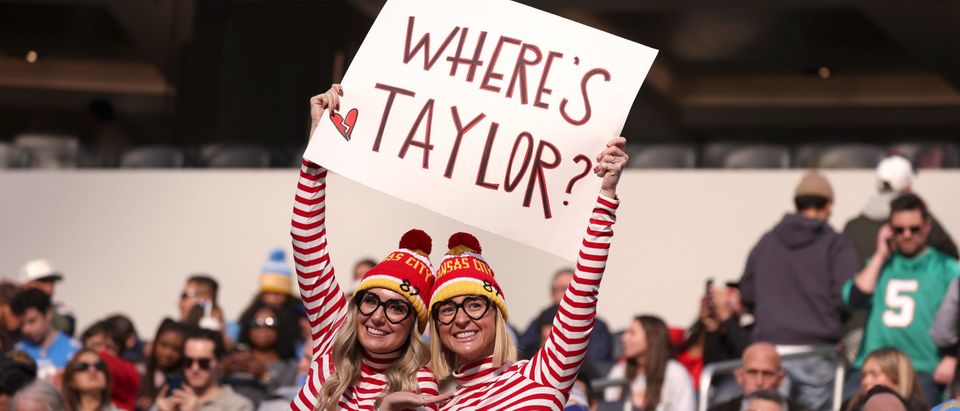 A view of fans holding a "Where's Taylor" sign during a game between the Kansas City Chiefs and Los Angeles Chargers at SoFi Stadium on January 07, 2024 in Inglewood, California. (Photo by Harry How/Getty Images)