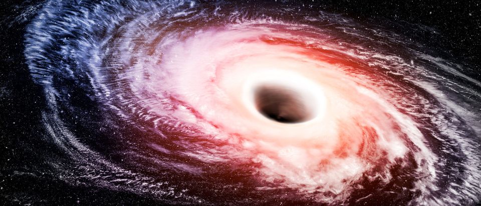 Astronomers find black hole devouring a sun a day, National
