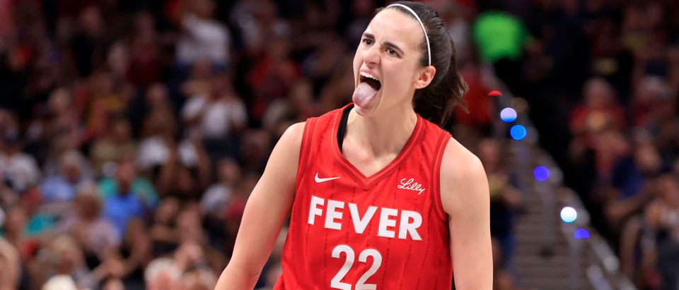 INDIANAPOLIS, INDIANA - AUGUST 16: Caitlin Clark #22 of the Indiana Fever reacts after a three pointer during the first half wam at Gainbridge Fieldhouse on August 16, 2024 in Indianapolis, Indiana. (Photo by Justin Casterline/Getty Images)